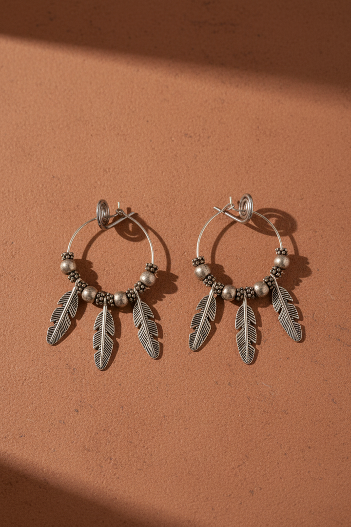 Oxidised Silver Hoop Earrings With Metal Feathers
